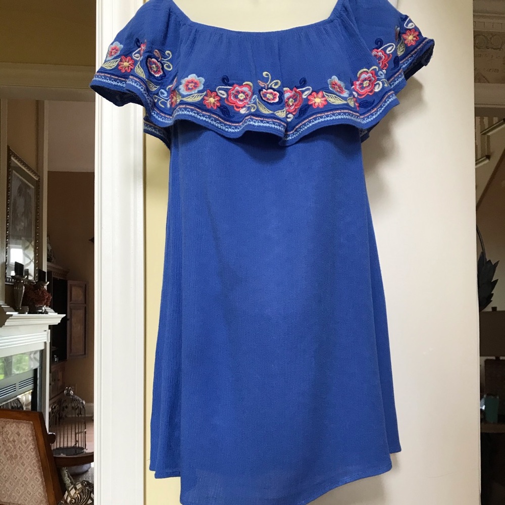 Willy Jay’s blue embroidered off the shoulders top